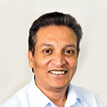 Portrait of Dr Cherian Varughese